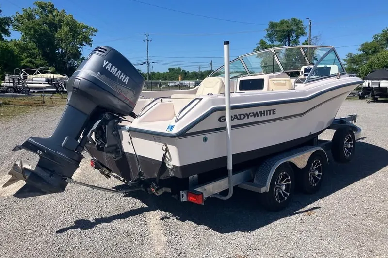 Slide: The Image of 1998 Grady-White Tournament 192 boat on trailer with Yamaha outboard motor. - 4