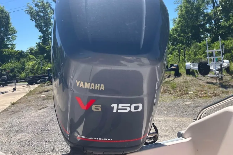 Slide: The Image of Yamaha V6 150 outboard motor on a 1998 Grady-White Tournament 192 boat. - 19