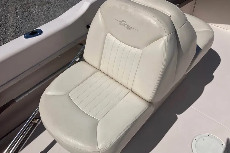 Slide: The Image of White leather seat on a 1998 Grady-White Tournament 192 boat. - 15