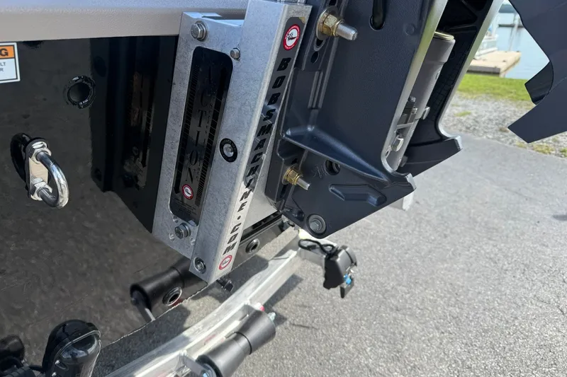 Slide: The Image of Close-up of Avid 207 Recon 2027 boat engine mount on a trailer. - 5
