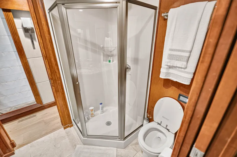 Slide: The Image of Modern bathroom with glass shower and toilet in 2011 STARDUST 18 x 85 model. - 18