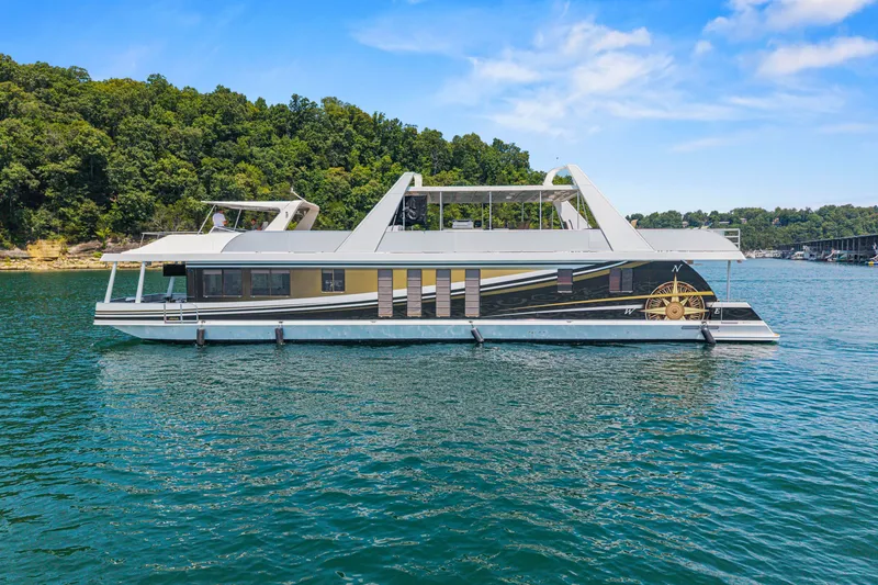 Slide: The Image of Luxurious 2011 STARDUST 18 x 85 houseboat cruising on a scenic lake. - 2