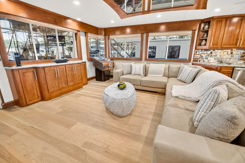 Slide: The Image of Luxurious 2011 STARDUST 18 x 85 houseboat interior with spacious seating and elegant wood finishes. - 10
