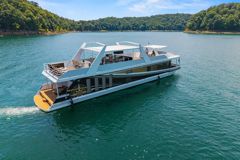 Slide: The Image of Luxurious 2011 STARDUST 18 x 85 houseboat cruising on a serene lake. - 6
