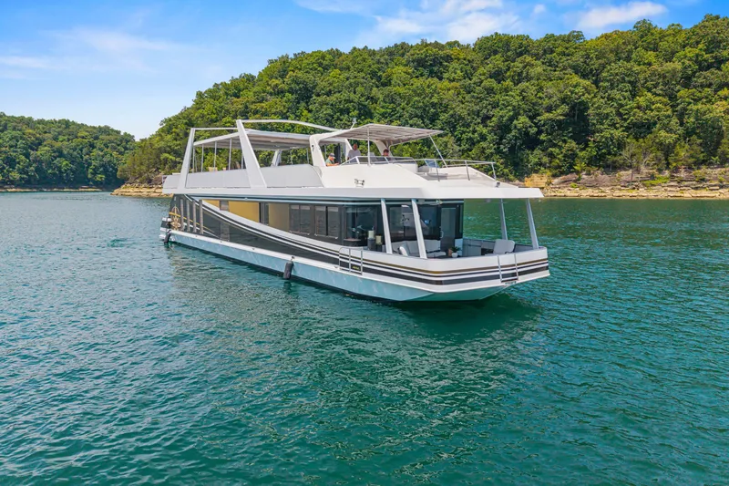 Slide: The Image of Luxurious 2011 STARDUST 18 x 85 houseboat cruising on a scenic lake. - 9