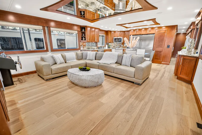Slide: The Image of Luxurious 2011 STARDUST 18 x 85 houseboat interior with modern kitchen and cozy living area. - 11