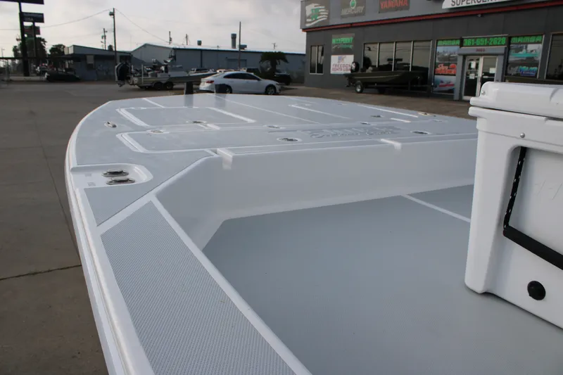 Slide: The Image of 2025 Mamba 24 Cat Elite boat deck at dealership, showcasing sleek design and spacious layout. - 23