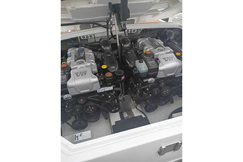 Slide: The Image of Twin V8 engines in a 2021 Monterey 328SS Super Sport boat engine compartment. - 12