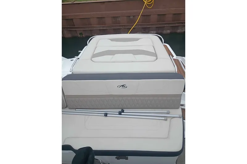 Slide: The Image of 2021 Monterey 328SS Super Sport boat with beige seating and sleek design. - 13