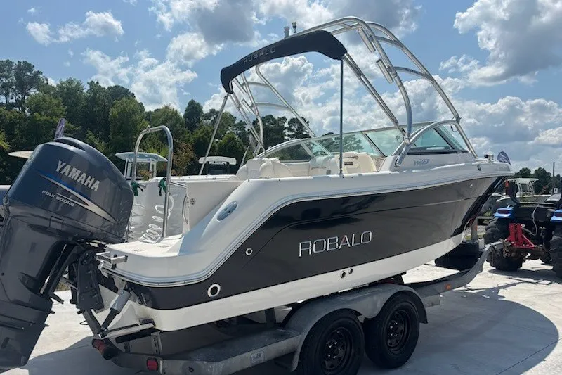 Slide: The Image of 2009 Robalo R227 Dual Console boat with Yamaha engine on trailer. - 2