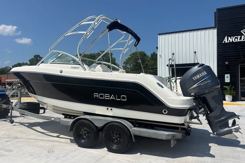 Slide: The Image of 2009 Robalo R227 Dual Console boat on trailer with Yamaha outboard motor. - 3