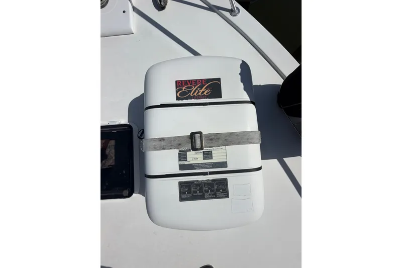 Slide: The Image of Life raft on 1996 Post 46 Convertible boat deck, secured with straps. - 8