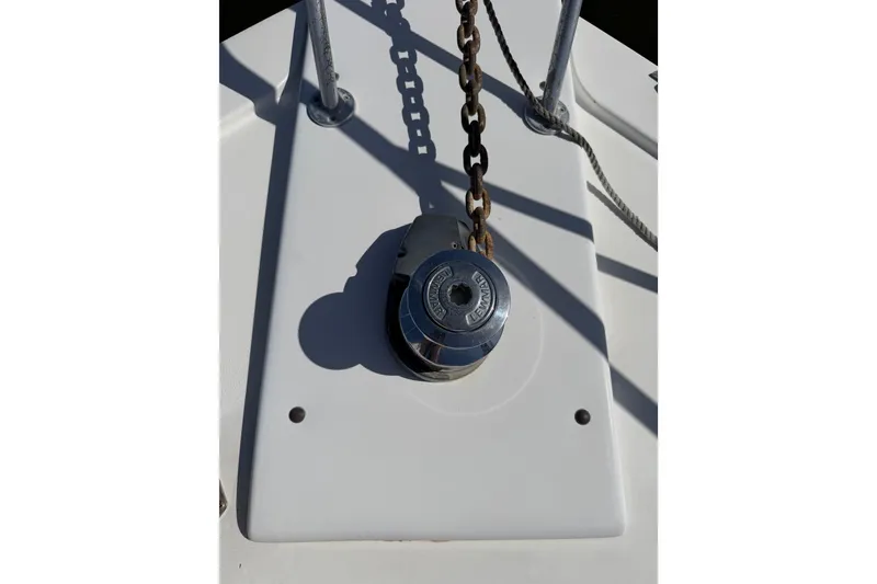 Slide: The Image of Anchor chain mechanism on a 1996 Post 46 Convertible boat. - 7