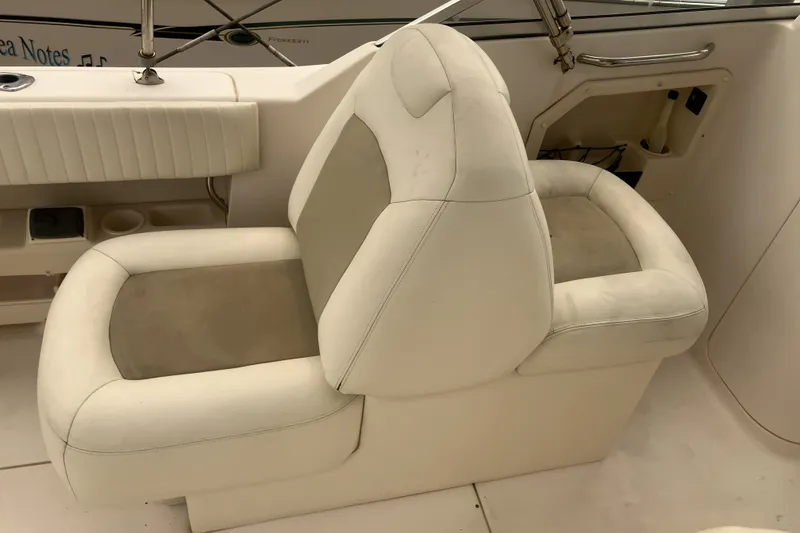 Slide: The Image of 2008 Grady White 275 Tournament boat interior with cushioned seating. - 31