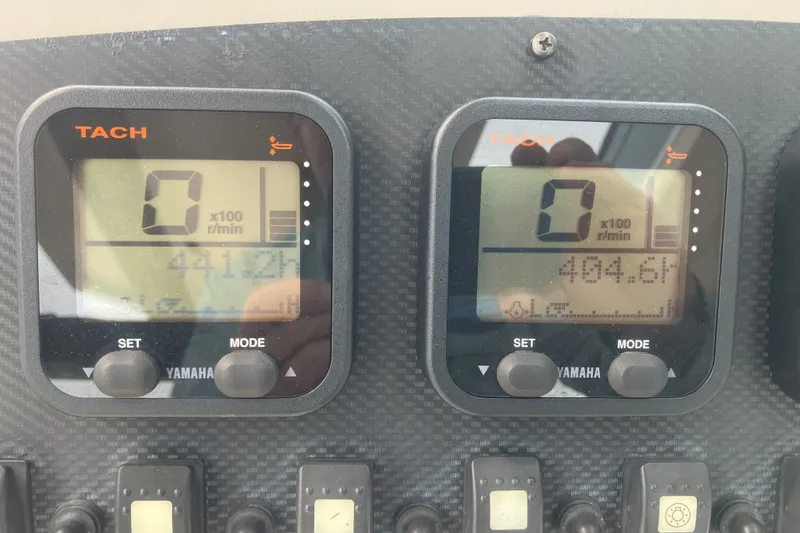 Slide: The Image of Yamaha tachometers on a 2008 Grady White 275 Tournament boat dashboard. - 19