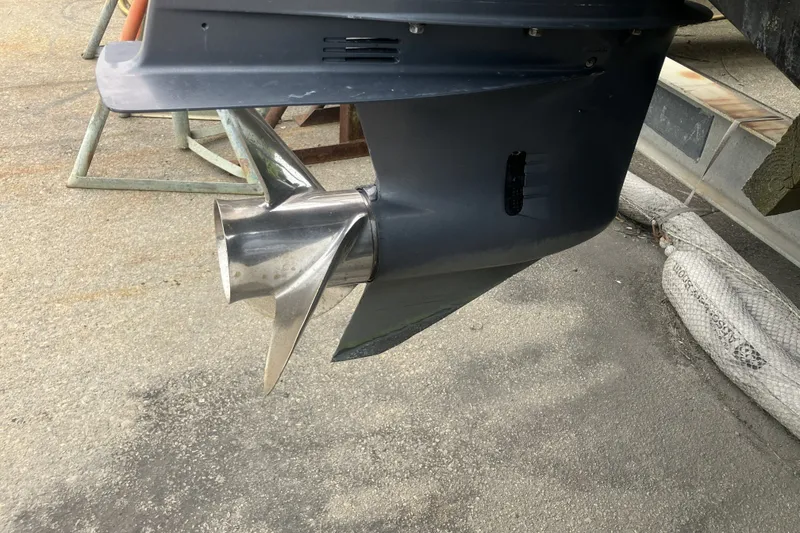Slide: The Image of Propeller of a 2008 Grady White 275 Tournament boat on a stand. - 25