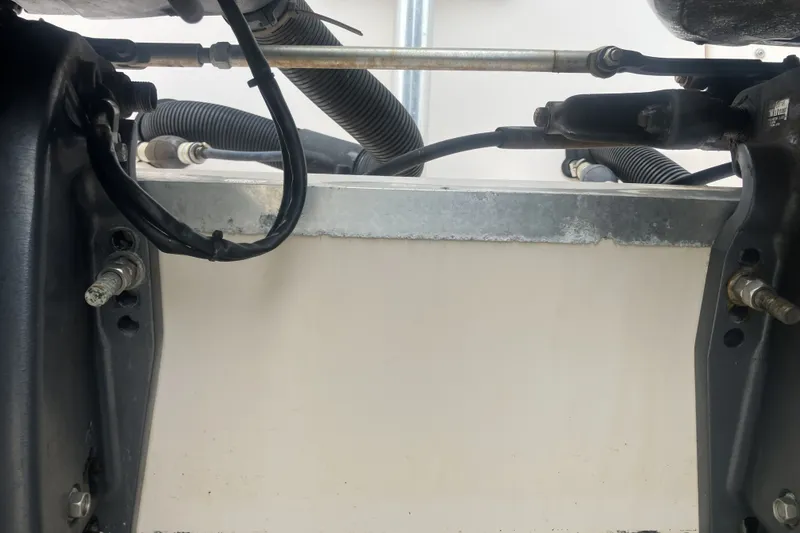 Slide: The Image of Close-up of 2008 Grady White 275 Tournament boat engine components and wiring. - 27