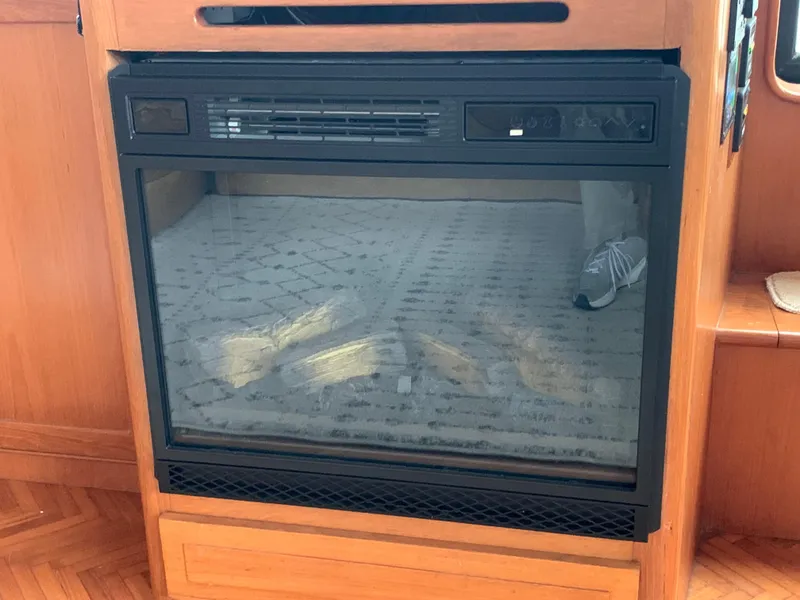 Slide: The Image of Electric fireplace in 1991 TransWorld Cockpit Motoryacht interior. - 18