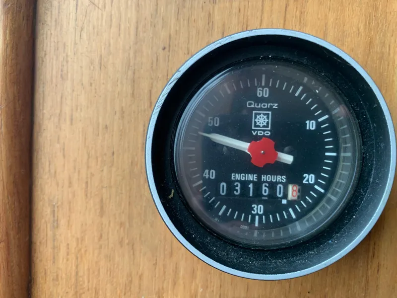Slide: The Image of Engine hours gauge on 1991 TransWorld Cockpit Motoryacht showing 3160 hours. - 19