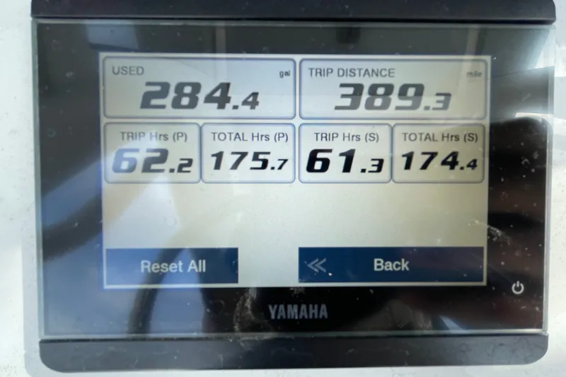 Slide: The Image of Display screen showing trip data for 2021 Sea Hunt Ultra 265SE boat. - 14