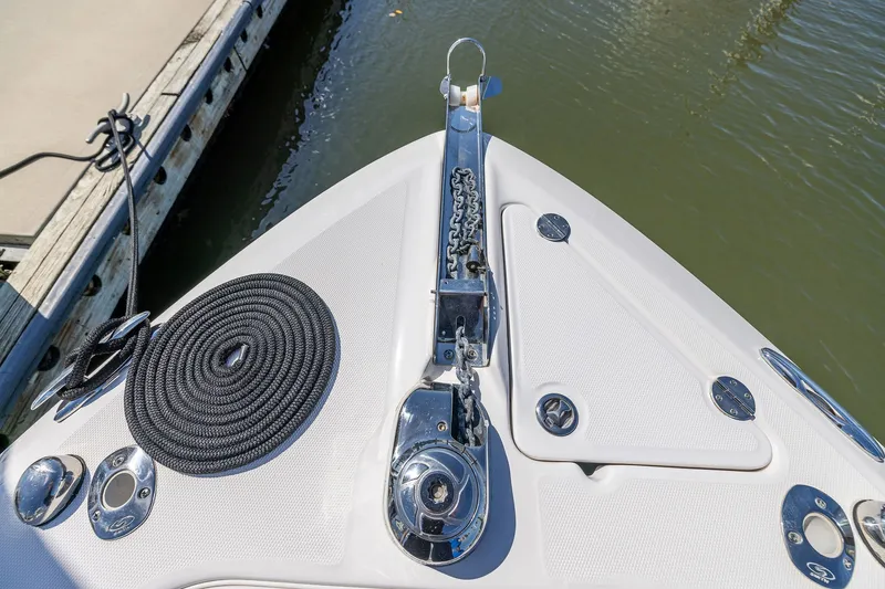 Slide: The Image of Bow of 2011 Everglades 295 Center Console with anchor and coiled rope. - 43