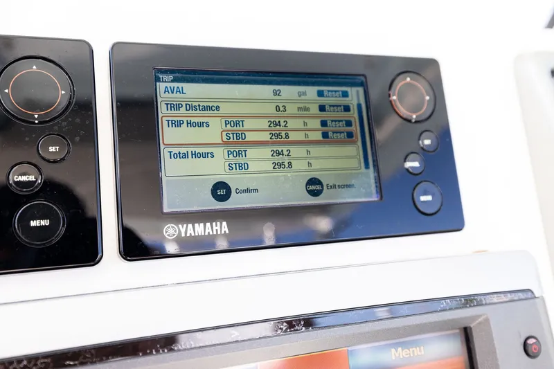 Slide: The Image of Yamaha display on 2011 Everglades 295 Center Console showing trip and total hours. - 32