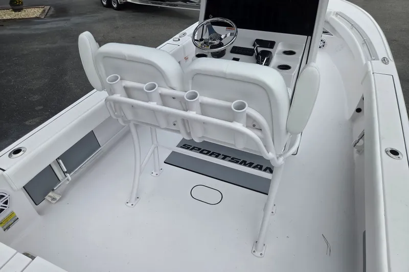 Slide: The Image of 2026 Sportsman Masters 247OE Bay Boat interior with seating and console. - 13