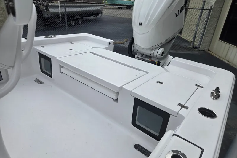 Slide: The Image of 2026 Sportsman Masters 247OE Bay Boat with Yamaha outboard engine, featuring spacious deck layout. - 14
