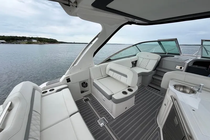 Slide: The Image of Luxurious interior of 2025 Regal 33 Express yacht with plush seating and sleek design. - 4