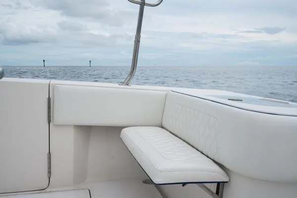 Slide: The Image of 2016 SeaHunter 45 Tournament boat interior with white seating, ocean view in background. - 23