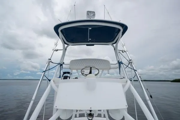 Slide: The Image of 2016 SeaHunter 45 Tournament boat helm with overcast sky background. - 12