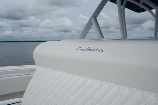 Slide: The Image of SeaHunter 45 Tournament 2016 boat with quilted white seating, ocean backdrop. - 29
