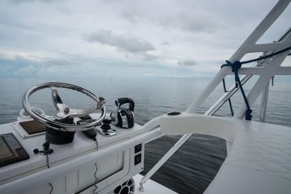 Slide: The Image of Helm of 2016 SeaHunter 45 Tournament boat with ocean view. - 14