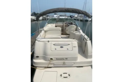 Slide: The Image of 2004 Sea Ray 240 Sundancer boat docked in Kenosha, WI marina. - 13