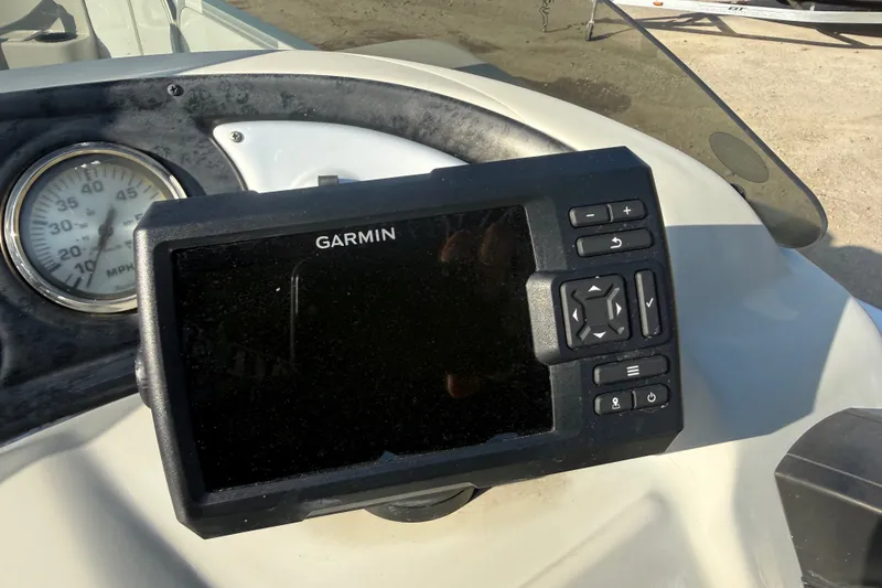 Slide: The Image of Garmin GPS device on 2020 SunCatcher V18 Fish boat dashboard with speedometer. - 44