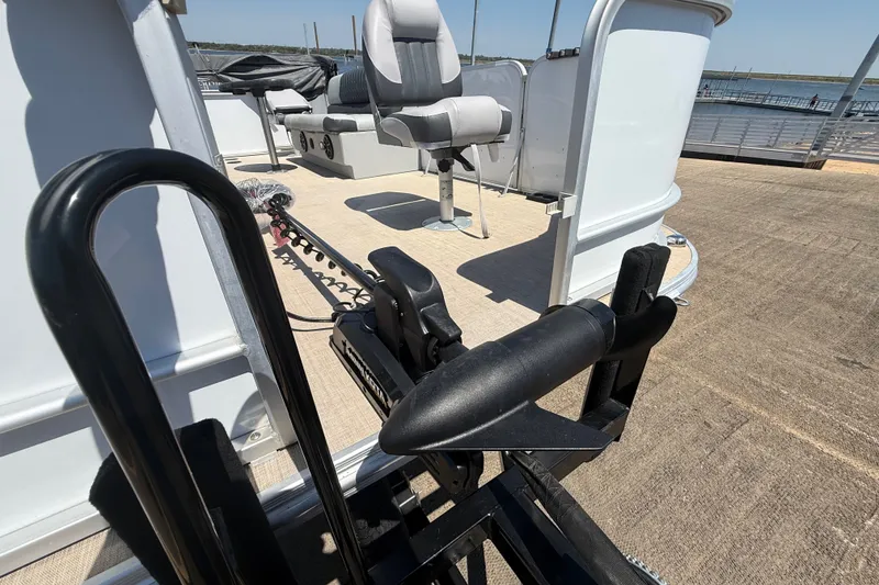 Slide: The Image of 2020 SunCatcher V18 Fish boat with seating and fishing equipment on deck. - 22