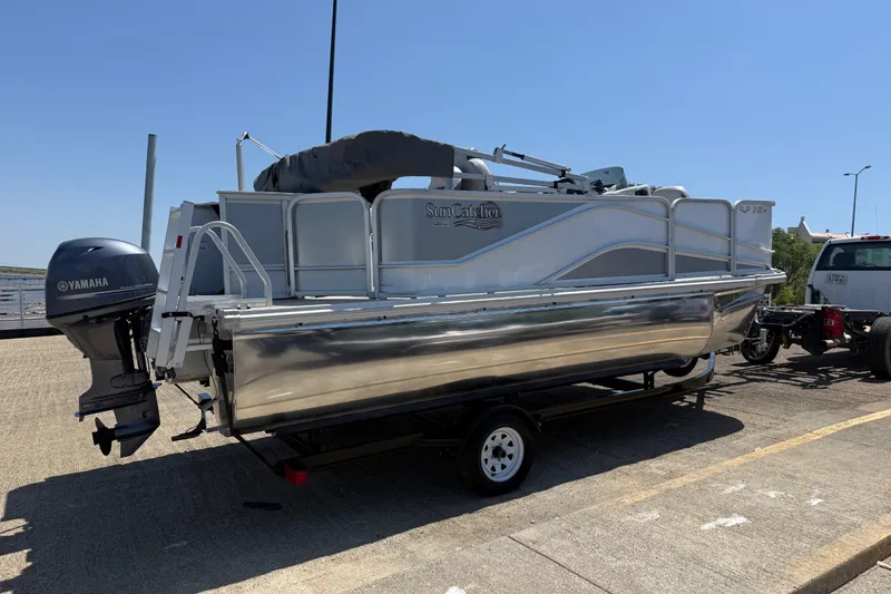 Slide: The Image of 2020 SunCatcher V18 Fish pontoon boat on trailer with Yamaha outboard motor. - 5
