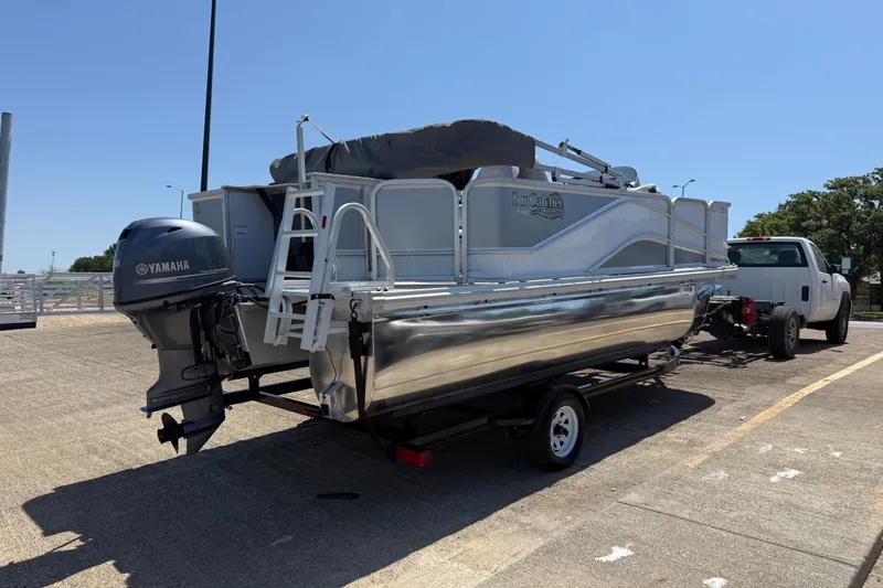 Slide: The Image of 2020 SunCatcher V18 Fish pontoon boat on trailer, featuring Yamaha outboard motor. - 6
