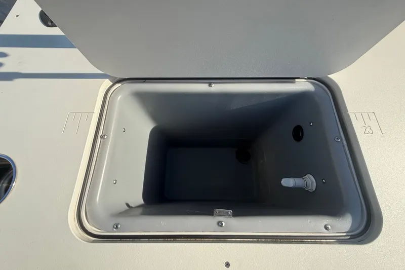 Slide: The Image of Open storage compartment on a 2020 SunCatcher V18 Fish boat. - 43