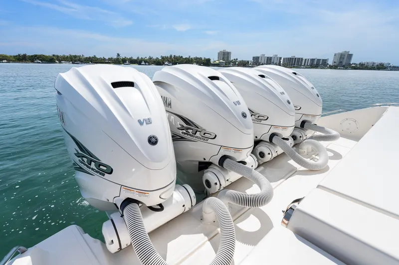 Slide: The Image of Four Yamaha V8 outboard engines on a 2022 Pursuit S 428 Sport boat. - 27