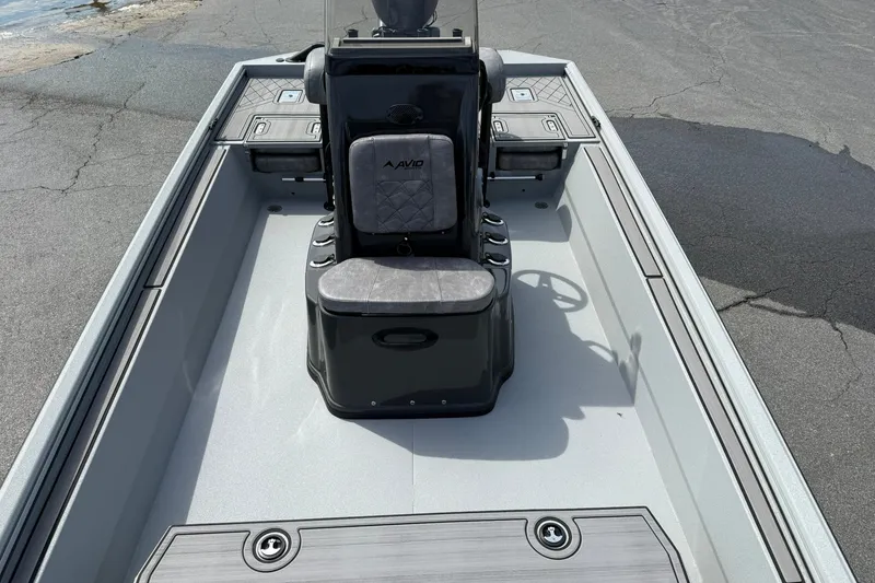 Slide: The Image of 2026 Avid 20 Rogue CC boat interior with sleek design and modern console. - 24