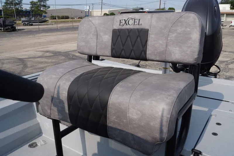 Slide: The Image of 2026 Excel 220 Bay Pro Elite boat seat with gray and black upholstery. - 12