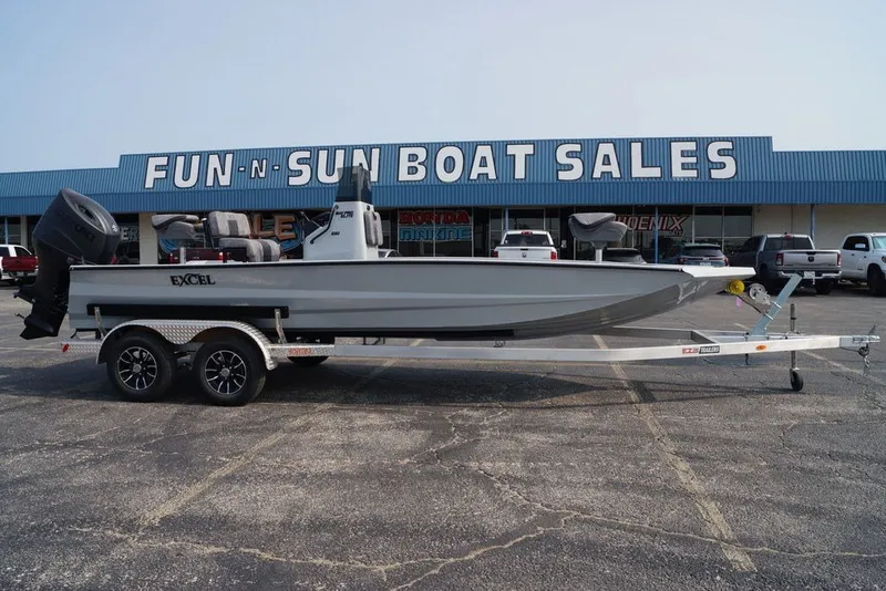 Slide: The Image of 2026 Excel 220 Bay Pro Elite boat on trailer at Fun-N-Sun Boat Sales. - 15