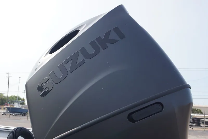 Slide: The Image of Suzuki outboard motor on 2026 Excel 220 Bay Pro Elite boat. - 5
