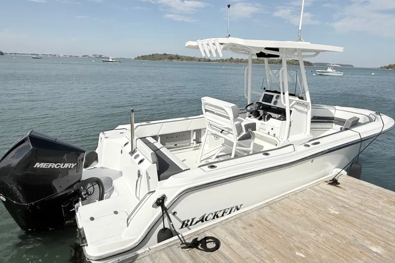 The Image of 2019 Blackfin 212 CC boat docked with Mercury engine, on a sunny day. - 0