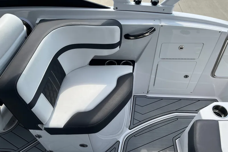 Slide: The Image of Luxurious seating on 2025 Monterey M6 boat with sleek black and white design. - 20