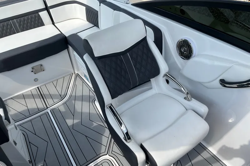 Slide: The Image of 2025 Monterey M6 boat interior with luxurious seating and modern design elements. - 18