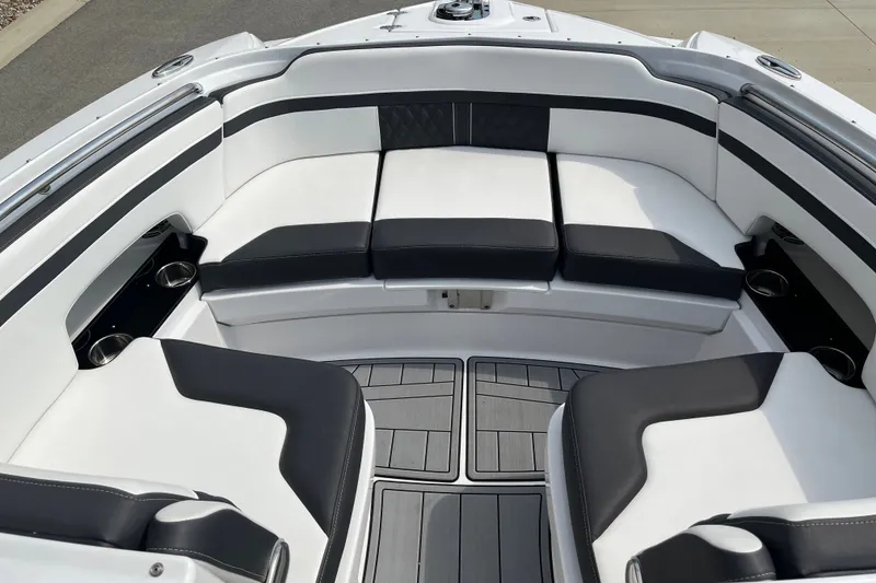 Slide: The Image of Luxurious seating area on 2025 Monterey M6 boat with sleek black and white upholstery. - 15