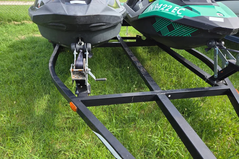 Slide: The Image of 2020 Sea Doo GTR 230 jet ski on trailer, parked on grass. - 5