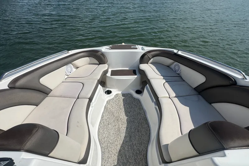 Slide: The Image of Luxurious seating on 2012 Yamaha Boats 242 Limited S, overlooking serene water. - 7